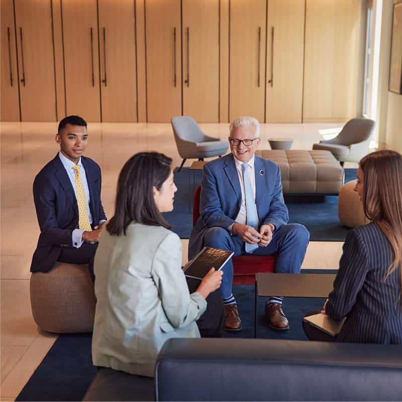 Businesspeople in a meeting to illustrate Employment