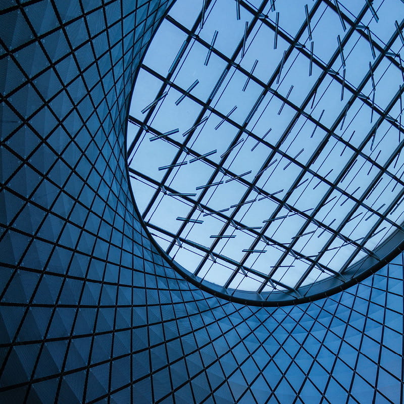 Glass ceiling showing blue sky to illustrate litigation, arbitration and investigations