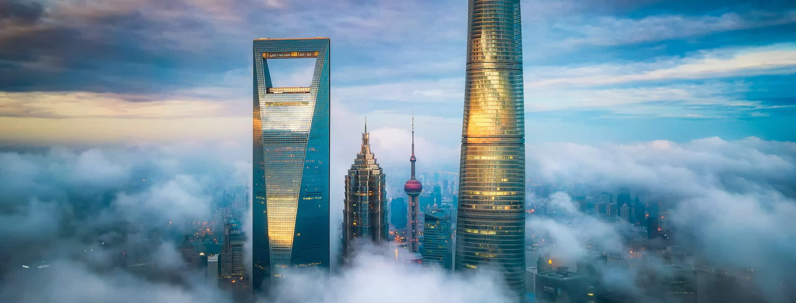 Skyscrapers surrounded by clouds