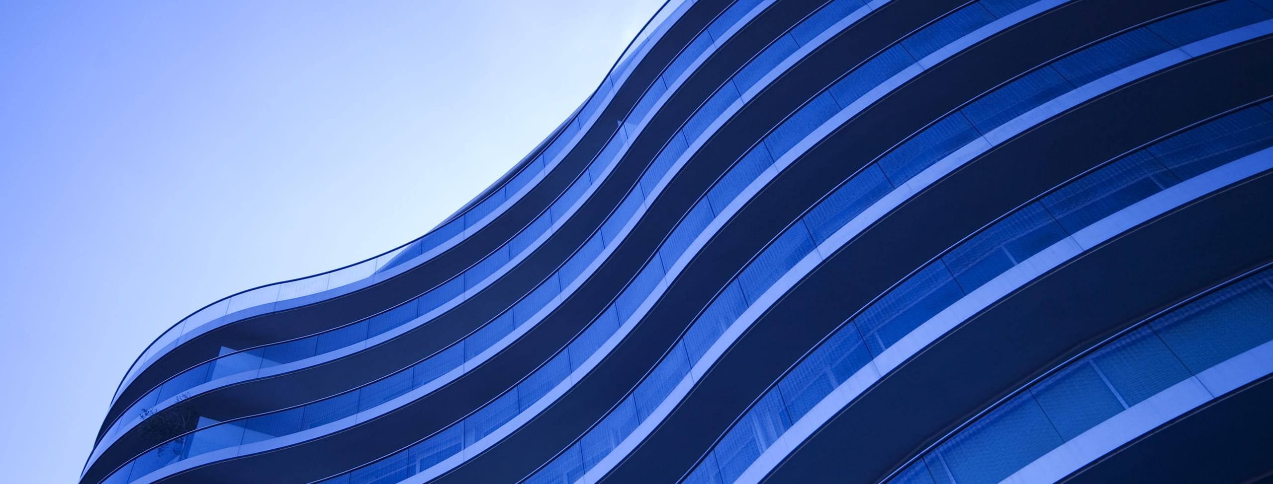 Abstract blue curved building