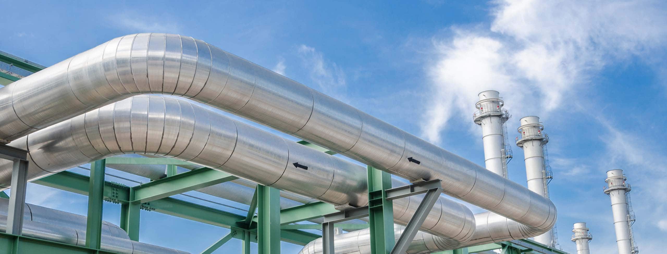 high pressure gas pipelines with the a blue sky in the background